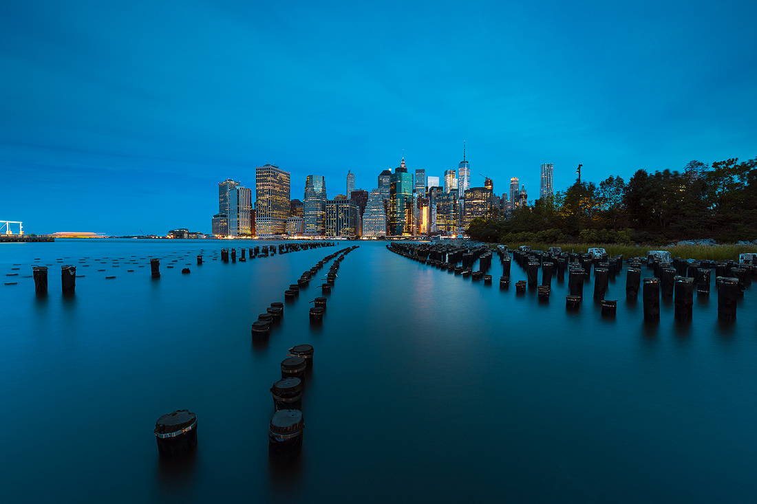 The lights of Manhattan great a chill morning, seen from Brooklyn