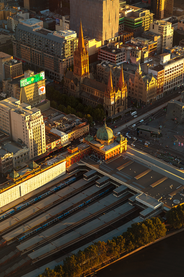 Golden morning light bathing the heart of Melbourne city